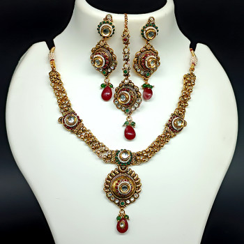 Gorgeous Ethnic Wear Gold Plated Uncut Antique Necklace Set with Tikka / Chutti