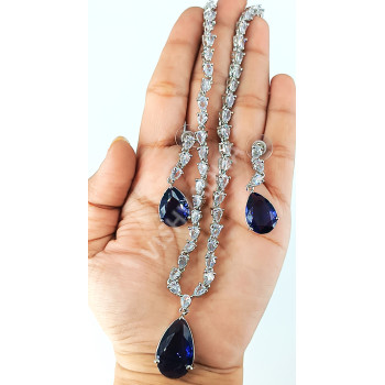 Celebrity Party Wear Full White Sparkling AD Stones Necklace with Dark Blue Pendant and Earrings